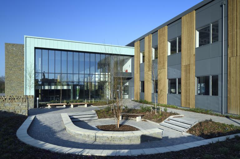 External view of building looking across sunken garden