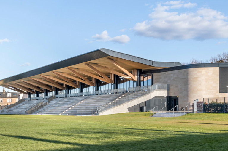 The main stand and rugby pitches at Raeburn Place.