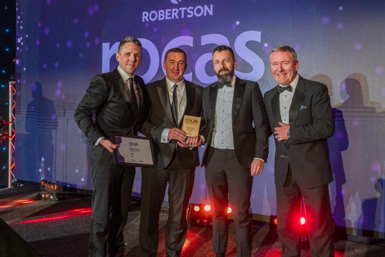 People holding awards from the Supply Chain Robertson Outstanding Contribution Awards